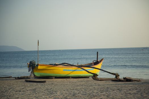 Boat by the ocean in India