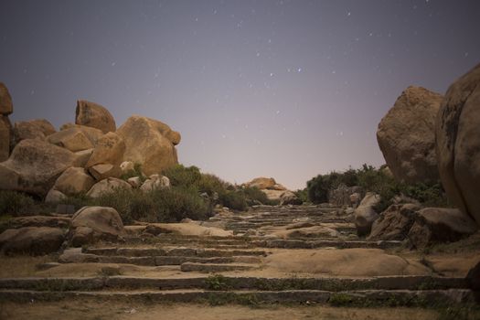 Old historic place called Hampi in Karnataka state in India at night.