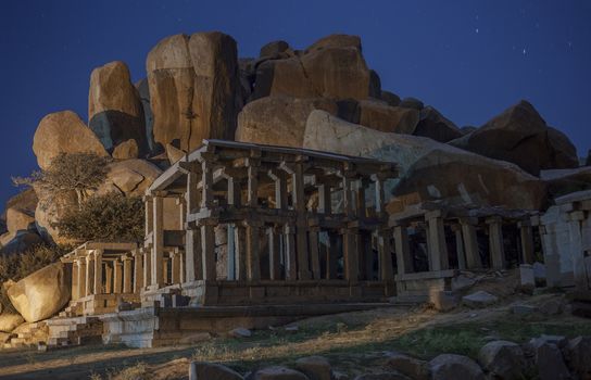 Ruins at night, opposite to Virupaksha - Vijayanagar Temple - at Hampi temple complex in India