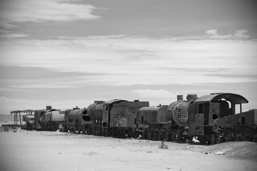 Abandoned old rusty train in black and white