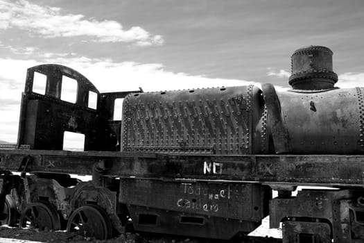 Abandoned old rusty train in black and white