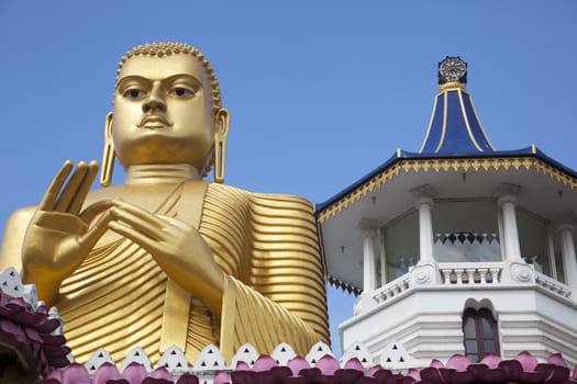Golden Buddha Statue In Front Of The Entrance To Dambulla Cave Temple, Outdoor
