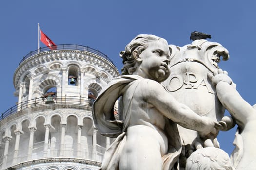 Pisa leaning tower and stone Cherubs