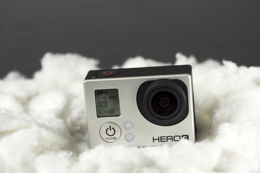 Camera surrounded by white cotton
