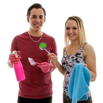 Young couple with cleaning supply over white background