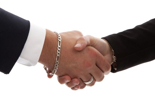 Two persons shaking hands in closeup over white background