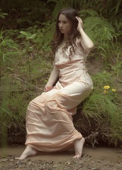 Fantasy girl in nature. Pre-Raphaelites concept.