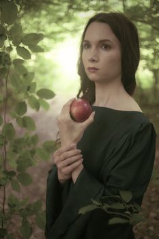 Fairytale girl with apple. Homage to the pre-Raphaelite painters.