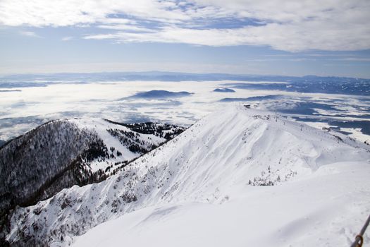 Mountain with a ski slope (shot on Krvavec, Slovenia)