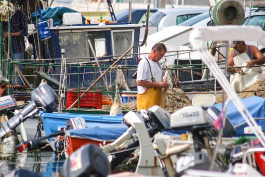 Fishermen in coastal town of Piran in Slovenia
