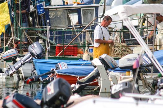 Fishermen in coastal town of Piran in Slovenia