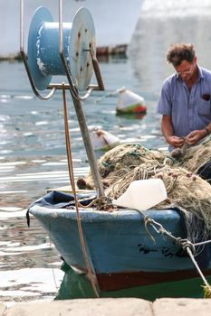 Fishermen in coastal town of Piran in Slovenia