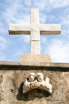Stone cross in Slovenian town Piran