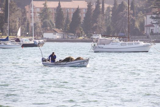 Fishermen in coastal town of Piran in Slovenia