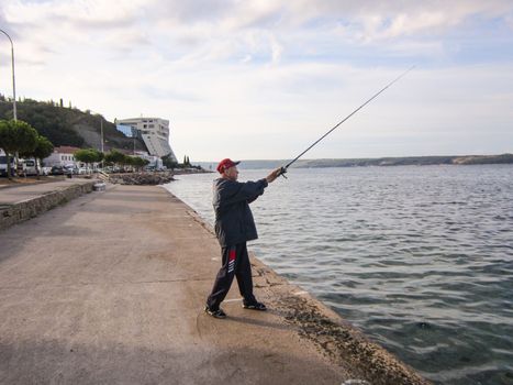 Fishermen in coastal town of Piran in Slovenia