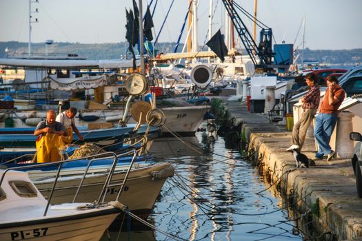 Fishermen in coastal town of Piran in Slovenia