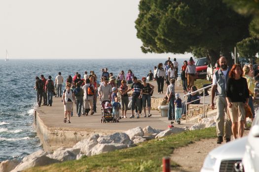 Crowded promenade in Trieste.