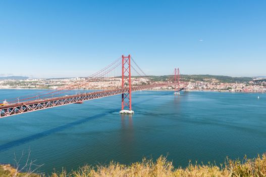 25th of April Suspension Bridge over the Tagus river in Lisbon, Portugal