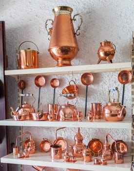 Portuguese copper utensils displayed in souvenir shop