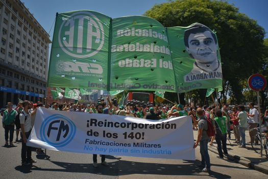 ARGENTINA, Buenos Aires: Demonstrators march in Buenos Aires, on February 1, 2016, in a show of support with 140 workers who were fired. The march took place near the Ministry of Defense of Argentina and protesters called for the workers to get their jobs back.