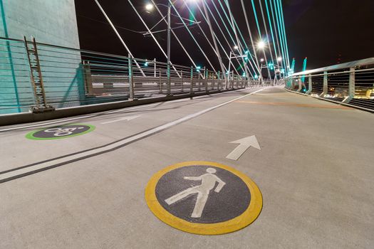 Bicycle Cyclist and Pedestrian Lane Signs on Tilikum Crossing Bridge in Portland Oregon