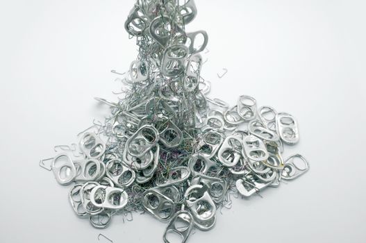 pile of many Metal pull ring of can and used staple needle