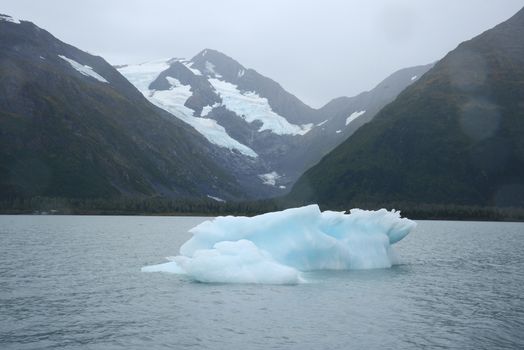 blue iceberg from portage glacier in alaska
