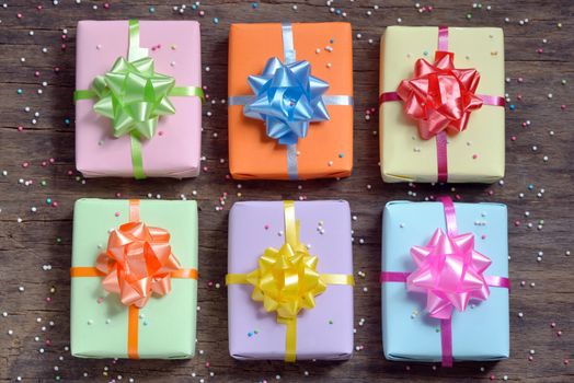 gift boxes on old wooden background