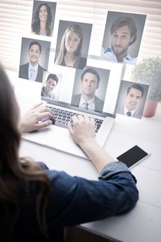 Profile pictures against woman using laptop