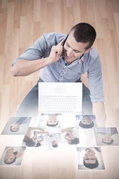 Business people having a meeting  against businessman talking on mobile phone