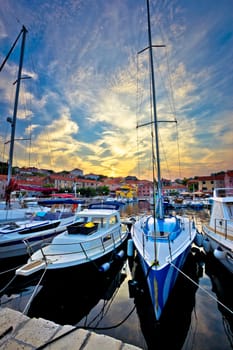 Sali village sunset in harbor vertical view, island of Dugi otok in Croatia