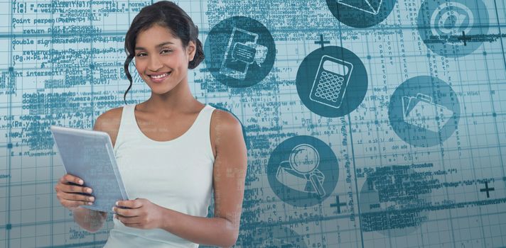 Portrait of smiling businesswoman using tablet computer against blue matrix and codes