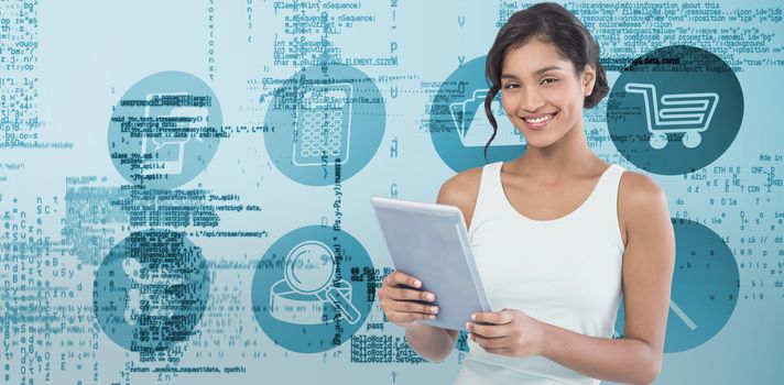 Portrait of smiling businesswoman using tablet computer against blue data