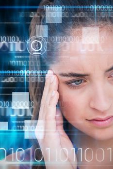 Close-up of beautiful woman suffering from headache against blue technology design with binary code