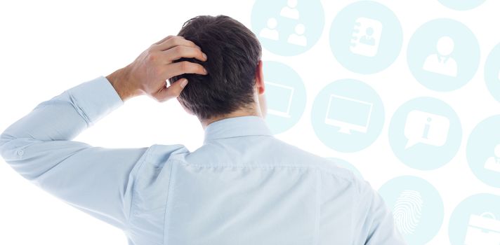 Businessman scratching his head against multiple blue icons 