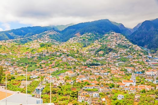 Funchal, Madeira - June 7, 2013: View over Funchal, the capital city of Madeira from Pico dos Barcelo.