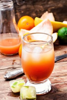 Glass of fresh juice from orange and lime.