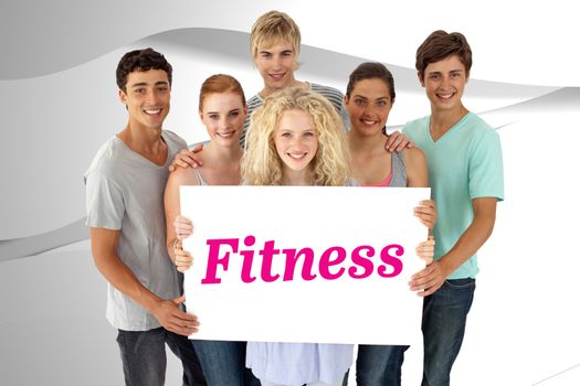 The word fitness and group of teenagers holding a blank card against white wave design