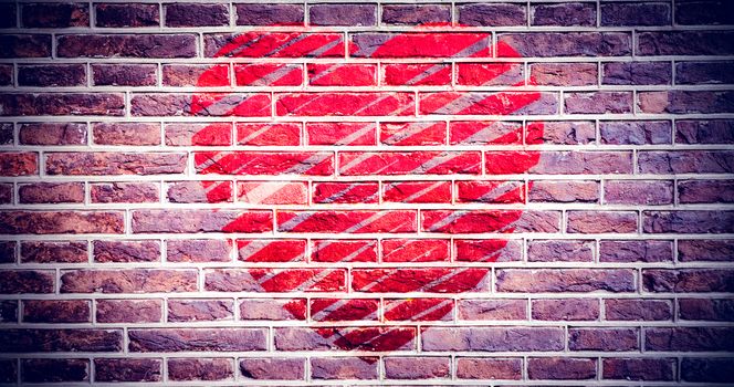 heart against red brick wall