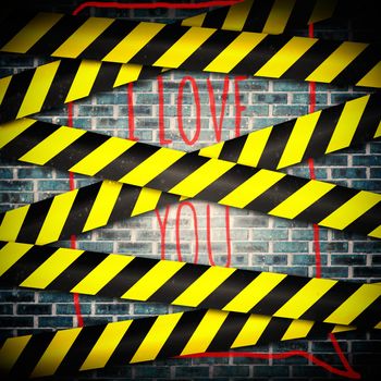 i love you against cordon tape over grey wall