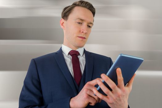 Businessman looking at his smartphone against abstract white design