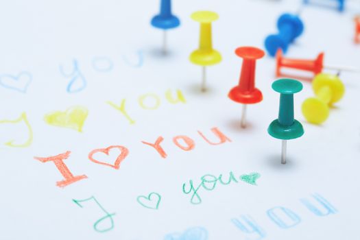 Love you letter with colorful push pins