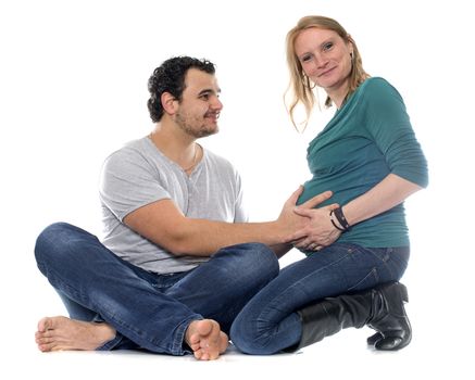 man and pregnant woman in front of white background