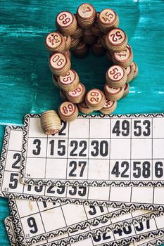 traditional legacy of the ancient Board game Lotto on wooden background