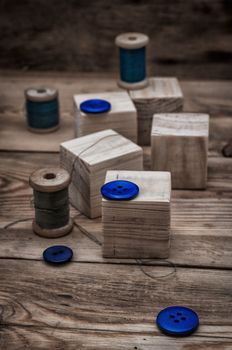 spool sewing thread and buttons in vintage style