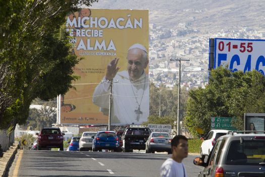 MEXICO, Morelia: A billboard for Pope Francis is on display on February 2, 2016, in Morelia before his scheduled visit to the country.The Pope is scheduled to visit four cities, including Morelia, when he arrives in Mexico for a week long visit, starting on February 12.