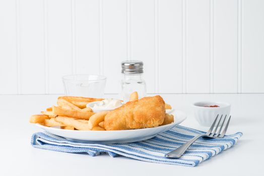 Deep fried haddock served with crispy chips.