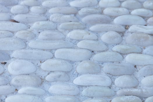 Smooth white stone textured background on a walkway