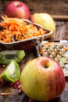 process of rubbing fragrant ripe fruit and carrots fruit salad