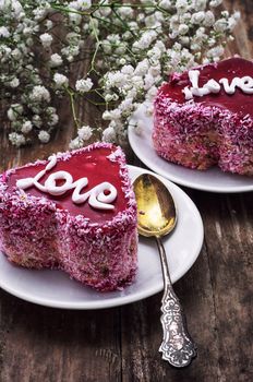 cake with fruit filling in the shape of heart with the inscription love